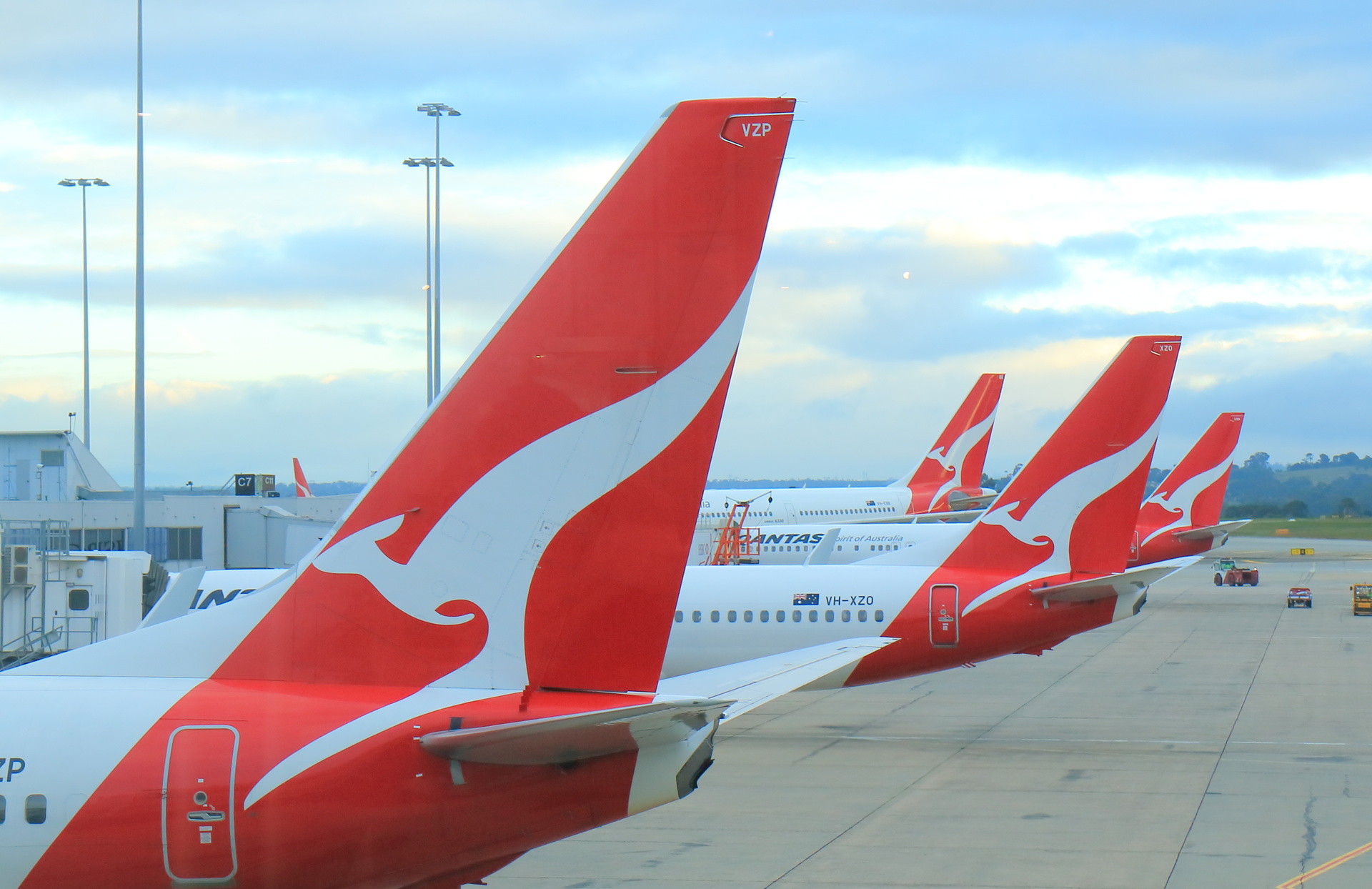 82216966 - melbourne australia - july 8, 2017: qantas airplanes wait for departure at melbourne airport australia.