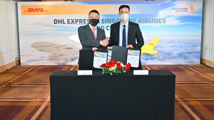 Ken Lee, CEO, DHL Express Asia Pacific and Lee Lik Hsin, Executive Vice President Commercial, Singapore Airlines have signed an agreement to mark an expanded partnership