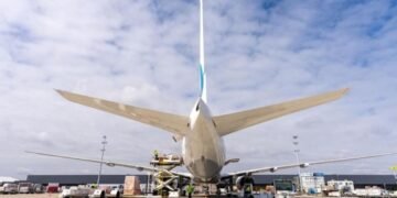 Freighter being loaded on airport apron