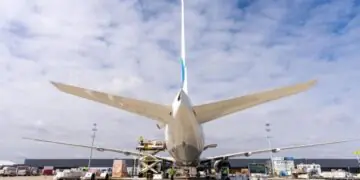 Freighter being loaded on airport apron